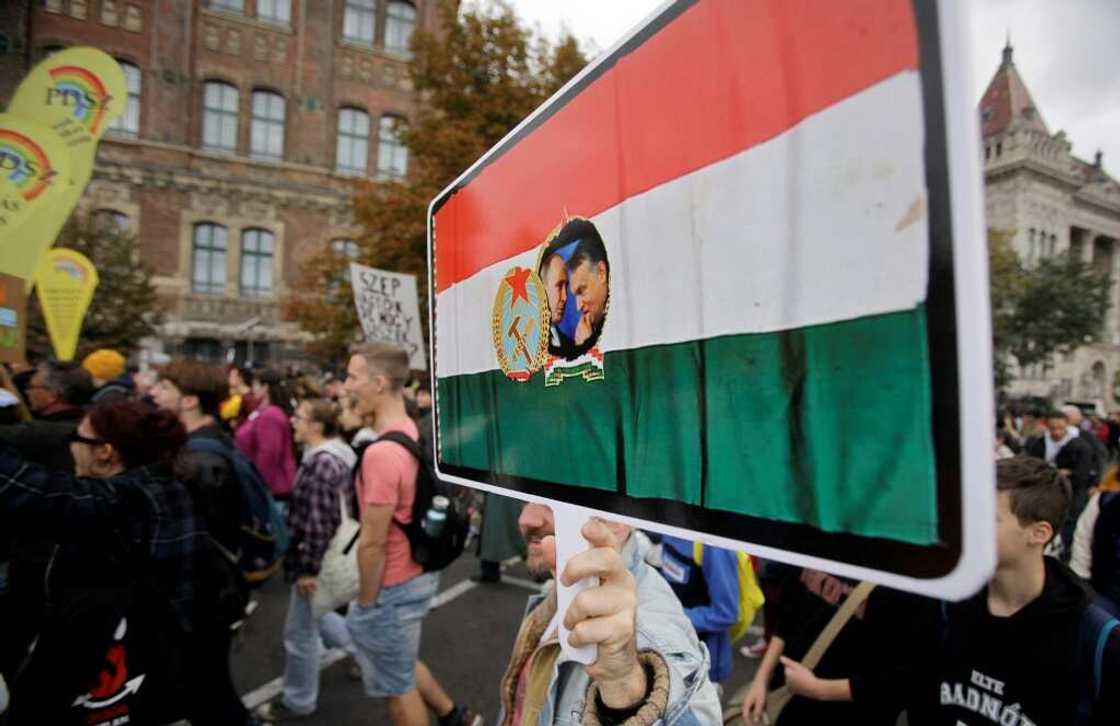 Some protesters denounced what they see as Orban's close ties with Russian leader Vladimir Putin Some protesters denounced what they see as Orban's close ties with Russian leader Vladimir Putin