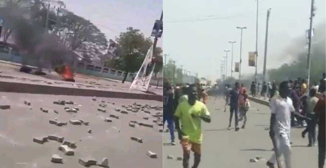 Youths protest Buhari's presence in Kano Youths protest Buhari's presence in Kano