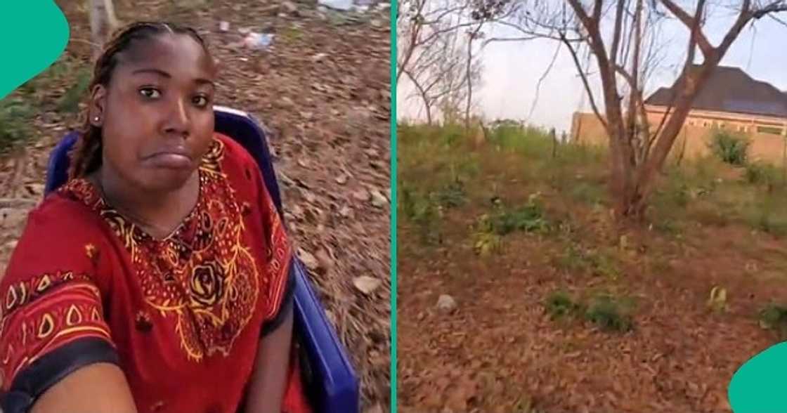Lady uses internet inside bush in village Lady uses internet inside bush in village