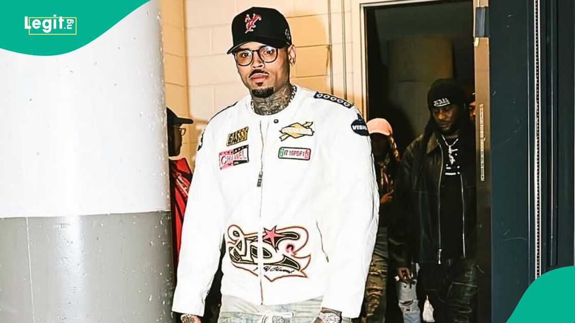 Chris Brown and fan take a photo