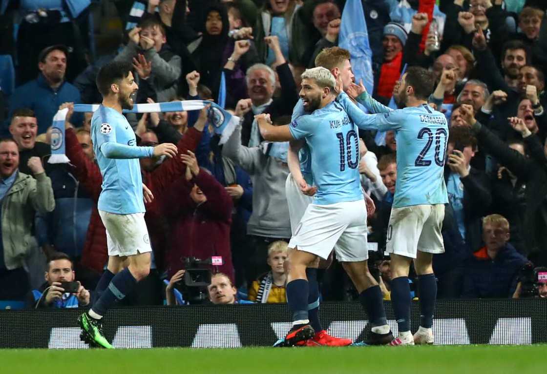 Manchester City players in action. Manchester City players in action.