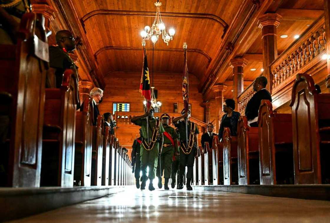 Members of Antigua and Barbuda's armed forces participate in a parade for Britain's late Queen Elizabeth II in Saint John's on September 19, 2022