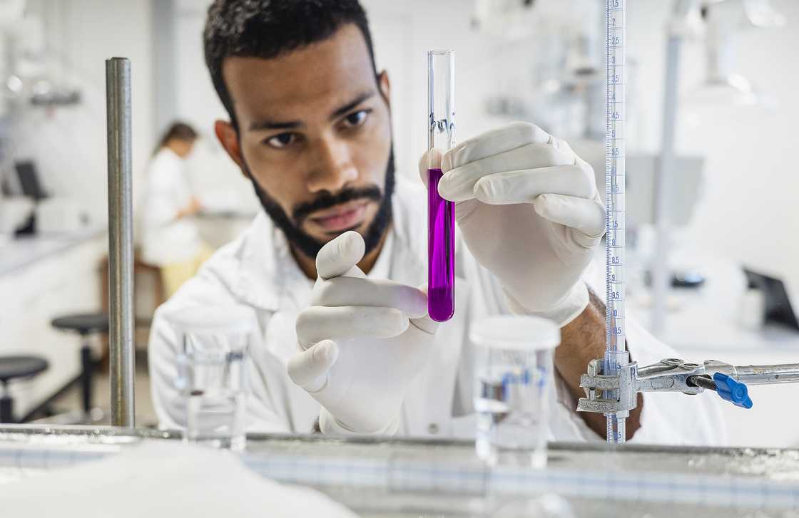 A chemist working in a laboratory A chemist working in a laboratory