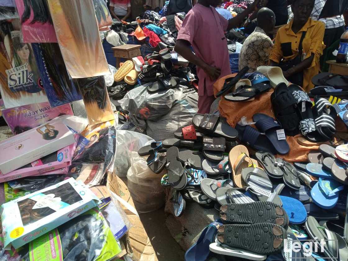 Hair extensions and slippers on display at a popular market in Lagos. Photo credit: Esther Odili Hair extensions and slippers on display at a popular market in Lagos. Photo credit: Esther Odili