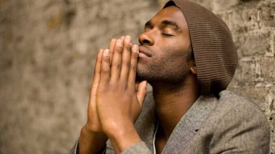 A man is praying for quick recovery A man is praying for quick recovery