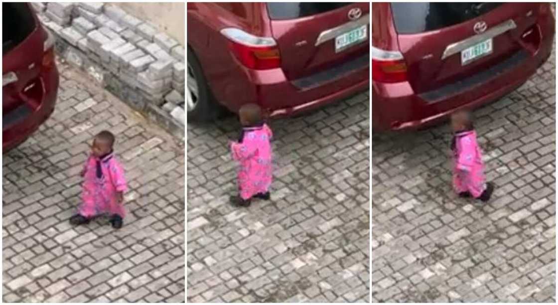 Nigerian kid in an oversized school uniform. Nigerian kid in an oversized school uniform.