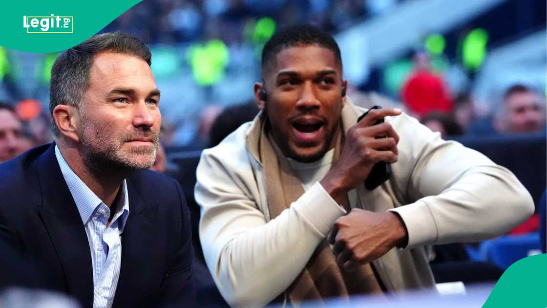 Eddie Hearn and Anthony Joshua in the stands at Tottenham Hotspur Stadium. Photo by Bradley Collyer