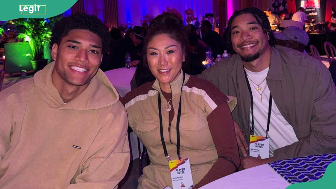 Kyle Hamilton, his mom, and his brother Tyler in a hotel
