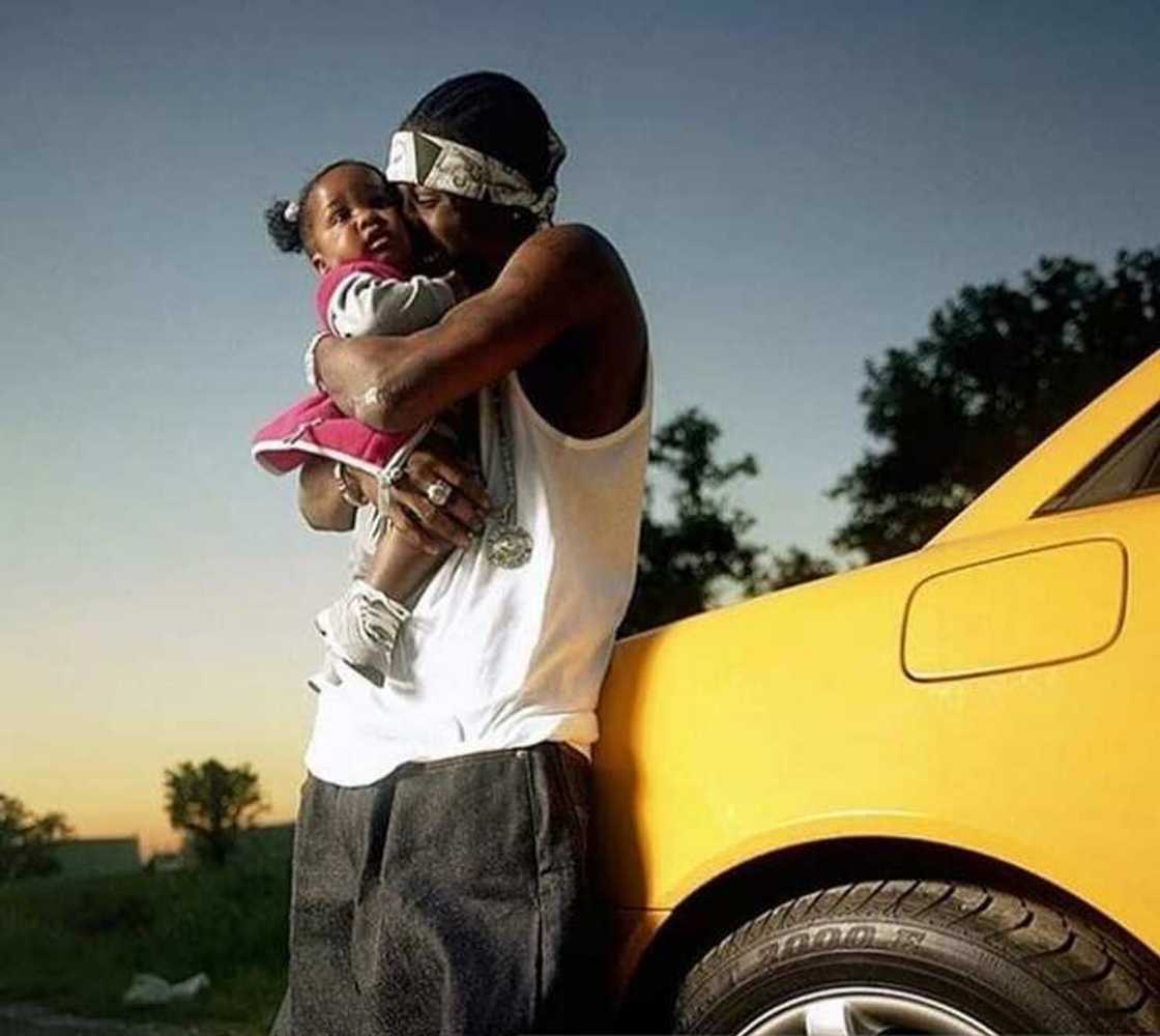 Lil Wayne with one of the four his children Lil Wayne with one of the four his children