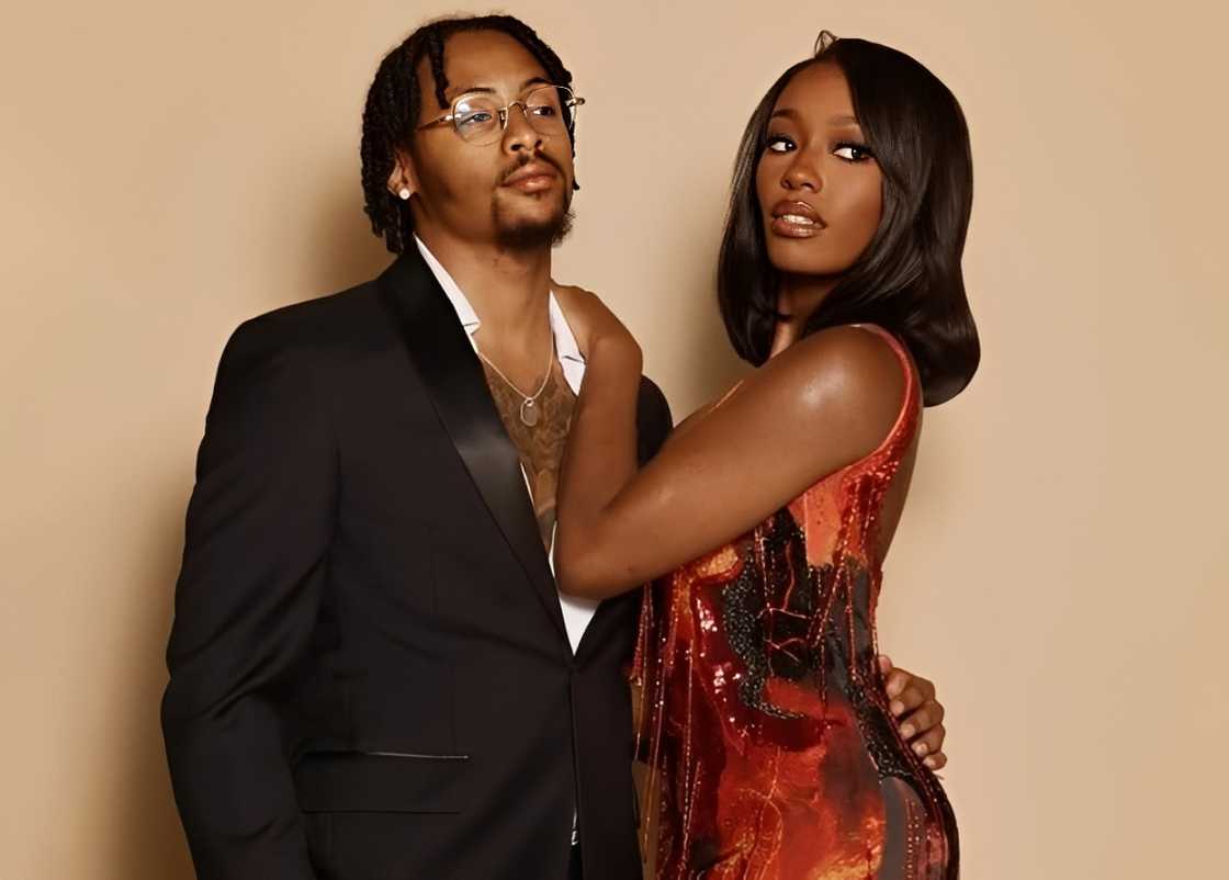 Serena Page and Kordell Beckham pose against a brown background Serena Page and Kordell Beckham pose against a brown background