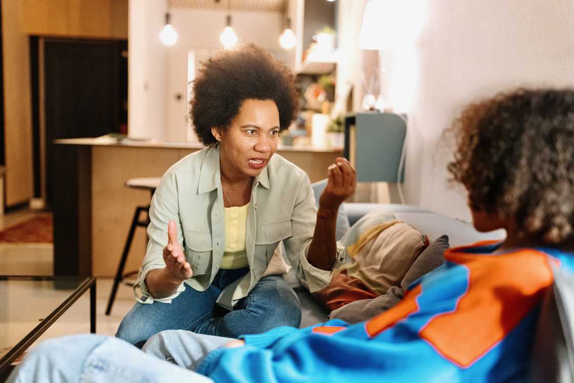 Mother arguing with her son Mother arguing with her son