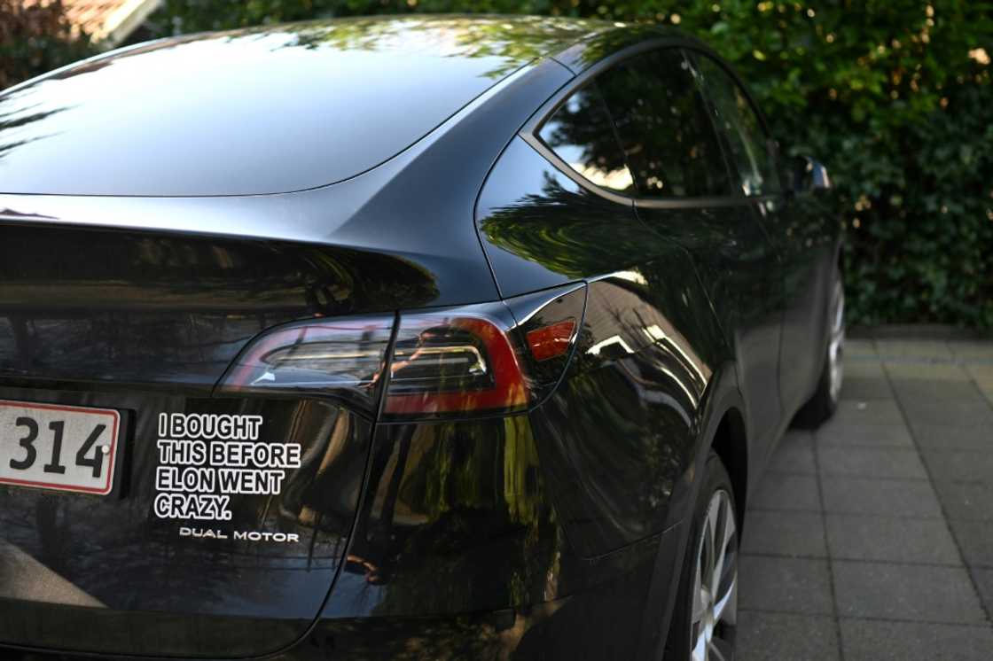 Buyer's regret? A Tesla driver in Denmark put this sticker on his car, a trend seen elsewhere in the United States and Europe