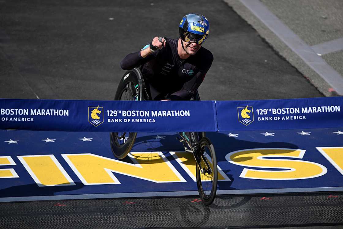 Marcel Hug of Switzerland crosses the finish line Marcel Hug of Switzerland crosses the finish line