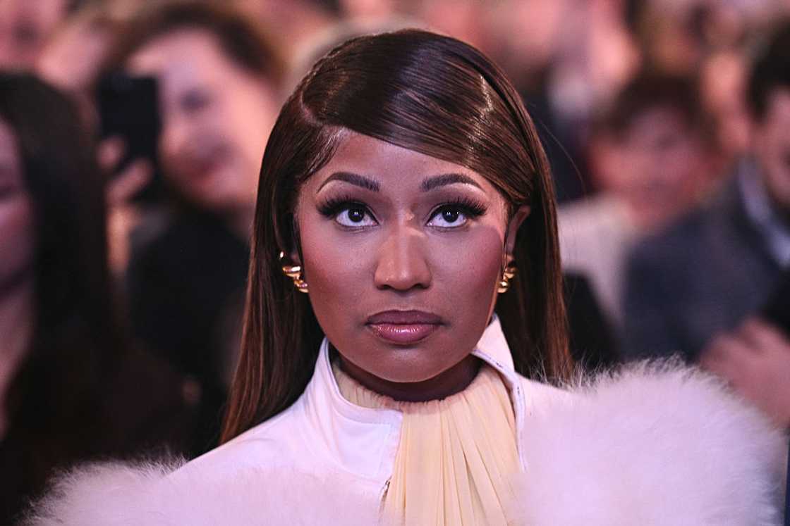 Nicki Minaj at a political event in white Nicki Minaj at a political event in white