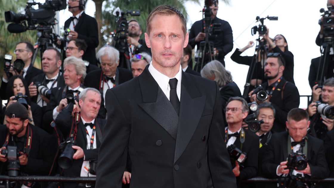 Alexander Skarsgård poses on the red carpet of the Phoenician Scheme premier at the 78th annual Cannes Film Festival at Palais des Festivals in Cannes, France Alexander Skarsgård poses on the red carpet of the Phoenician Scheme premier at the 78th annual Cannes Film Festival at Palais des Festivals in Cannes, France