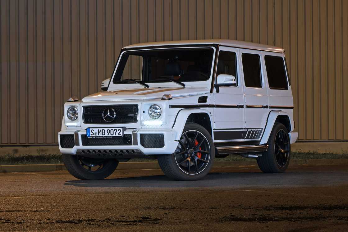 Mercedes-AMG G63 on a street at night.