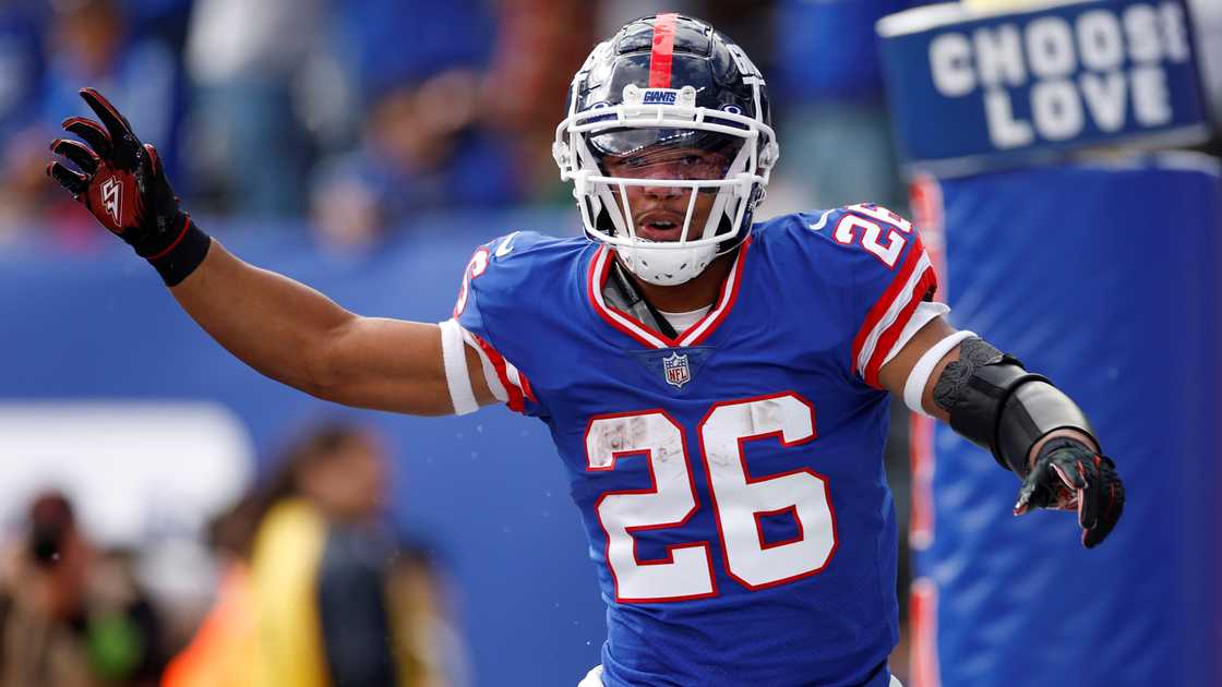 Saquon Barkley runs after scoring a touchdown.