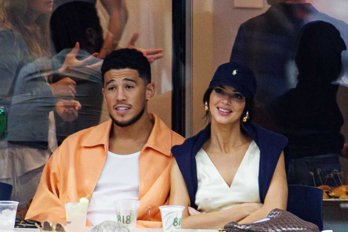 Kendall and Devin watching a game in 2022
