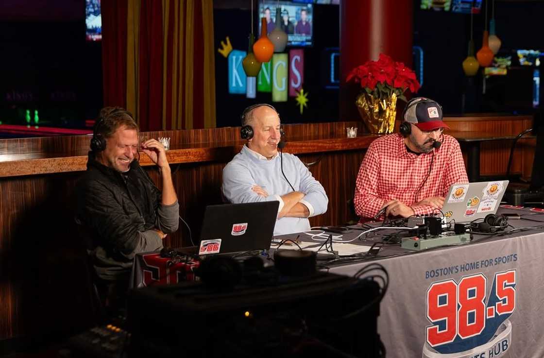 Tony Massarotti (C) alongside colleagues at 98.5 The Sports Hub