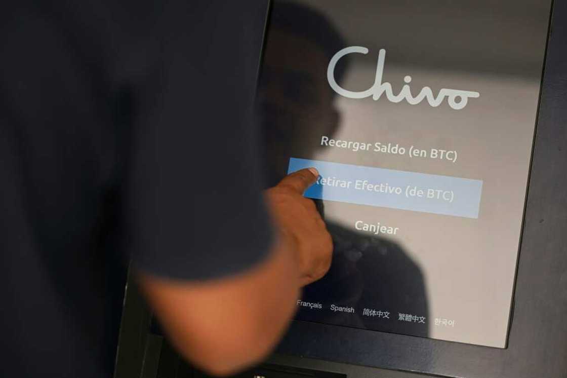 A man withdraws money sent by relatives living abroad using an electronic wallet created by the government of El Salvador A man withdraws money sent by relatives living abroad using an electronic wallet created by the government of El Salvador