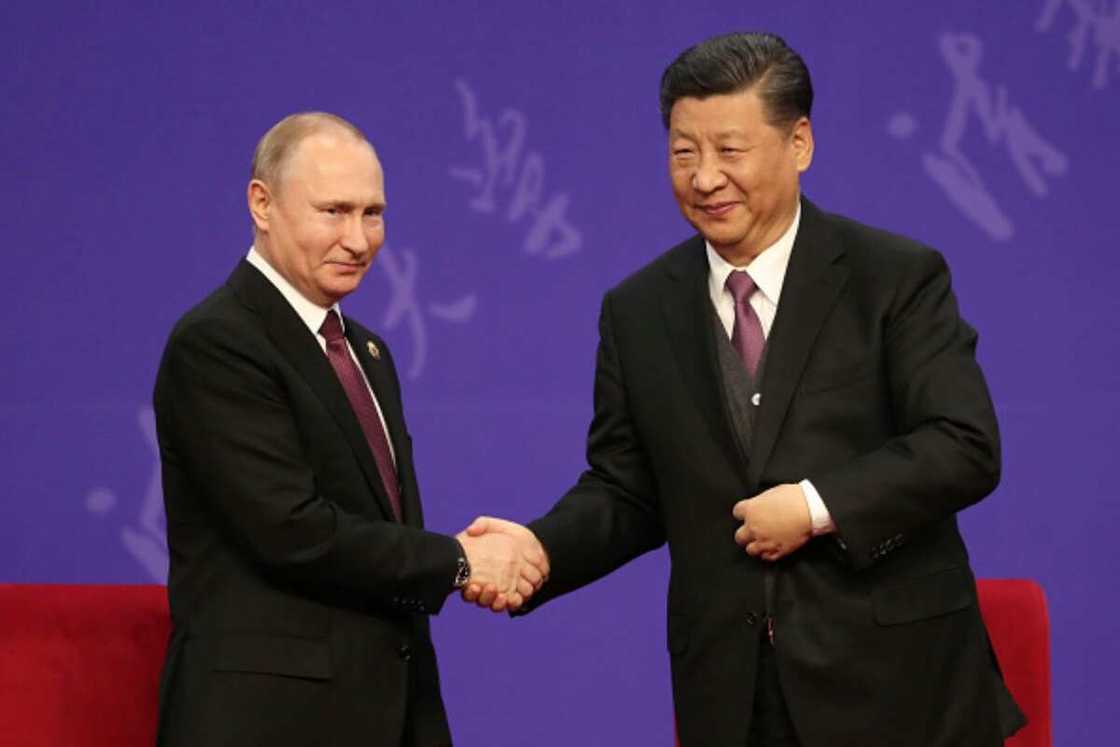 Putin and Xi Putin and Xi