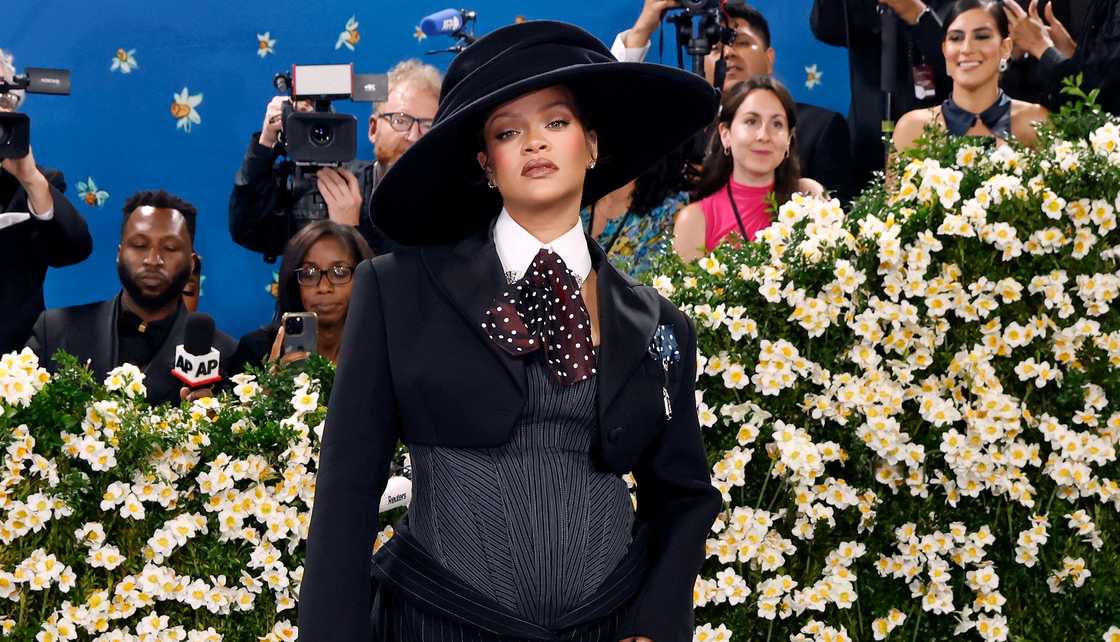Rihanna poses on the red carpet of the 2025 Costume Institute Benefit