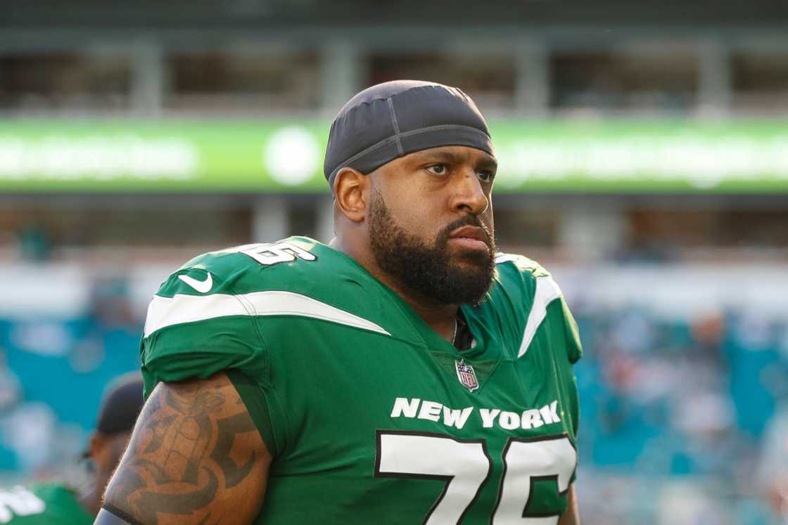 Duane Brown #76 of the New York Jets looks on during a game against the Miami Dolphins