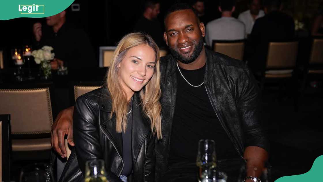 Monica and Yordan Alvarez at a restaurant