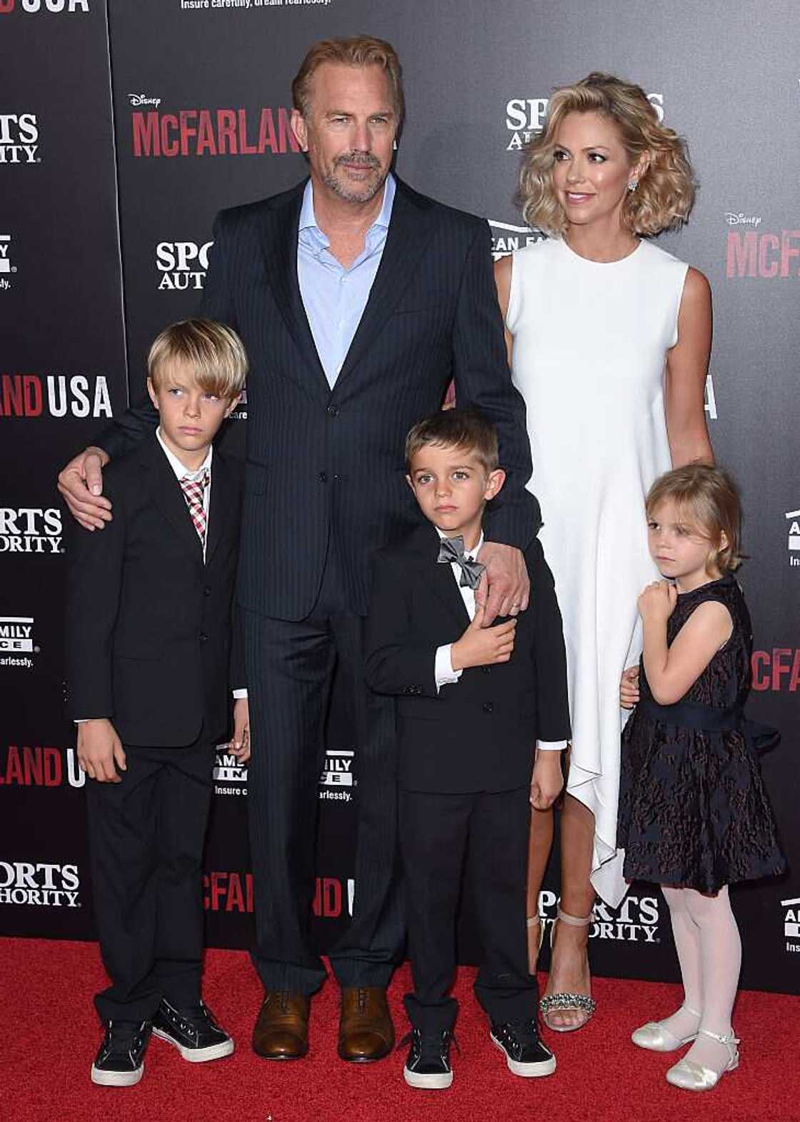 Kevin Costner, Christine Baumgartner and children Grace Avery Costner, Hayes Logan Costner and Cayden Wyatt Costner arrive at the World Premiere of Disney's 'McFarland, USA' on February 9, 2015 in Hollywood. (Photo by Axelle/Bauer-Griffin/FilmMagic)