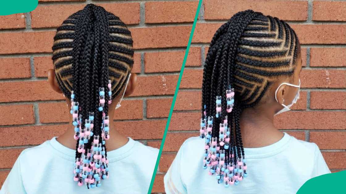 A girl wearing Mohawk-styled cornrows A girl wearing Mohawk-styled cornrows