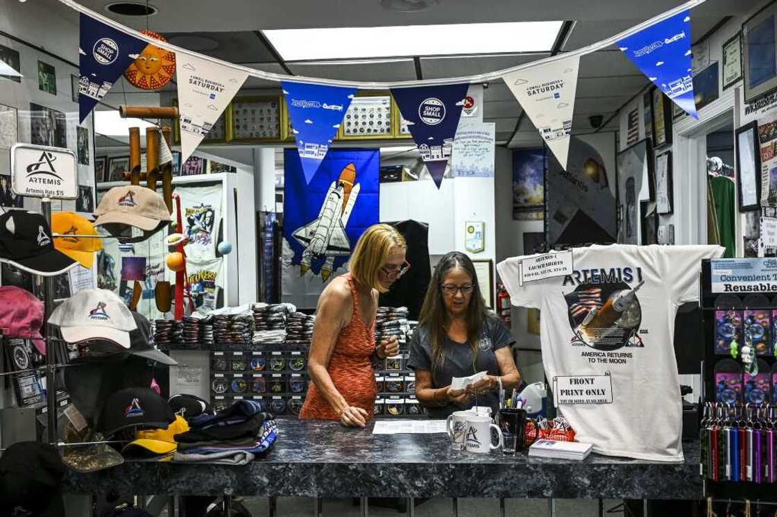 As soon as they enter the store Space Shirts, visitors are greeted with Artemis rocket t-shirts for sale As soon as they enter the store Space Shirts, visitors are greeted with Artemis rocket t-shirts for sale