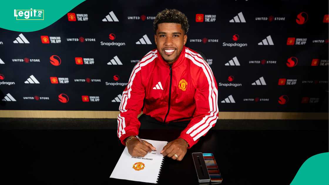 Andrey Santos of Manchester United poses after signing for the club at Carrington Training Ground. Photo by Manchester United Andrey Santos of Manchester United poses after signing for the club at Carrington Training Ground. Photo by Manchester United
