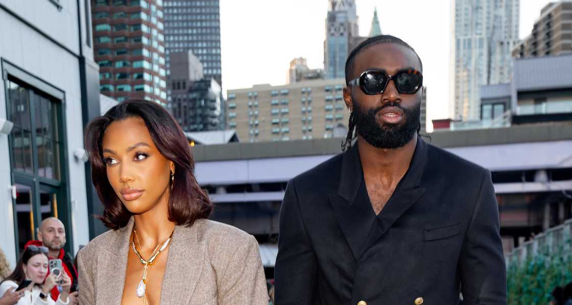 Jaylen Brown and Kysre Gondrezick walk into the NY FW.