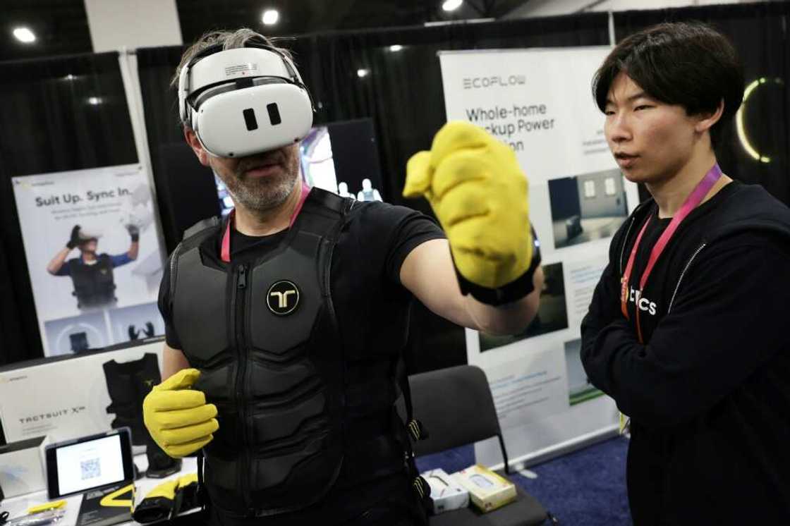 A man tries out the Haptic Suit by bHaptics at the CES tech show in Las Vegas A man tries out the Haptic Suit by bHaptics at the CES tech show in Las Vegas