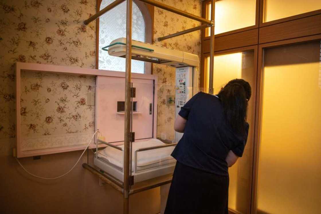 When the alarm sounds at Jikei hospital in southern Japan, nurses race down a spiral staircase to the baby hatch room When the alarm sounds at Jikei hospital in southern Japan, nurses race down a spiral staircase to the baby hatch room