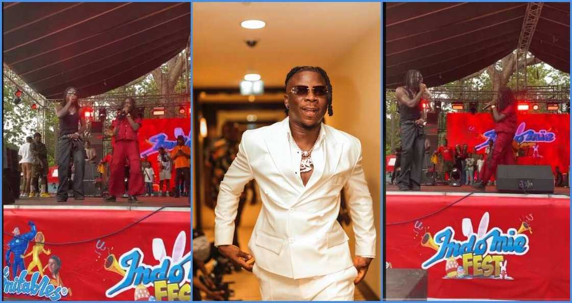 Stonebwoy performs on stage with young fan Stonebwoy performs on stage with young fan
