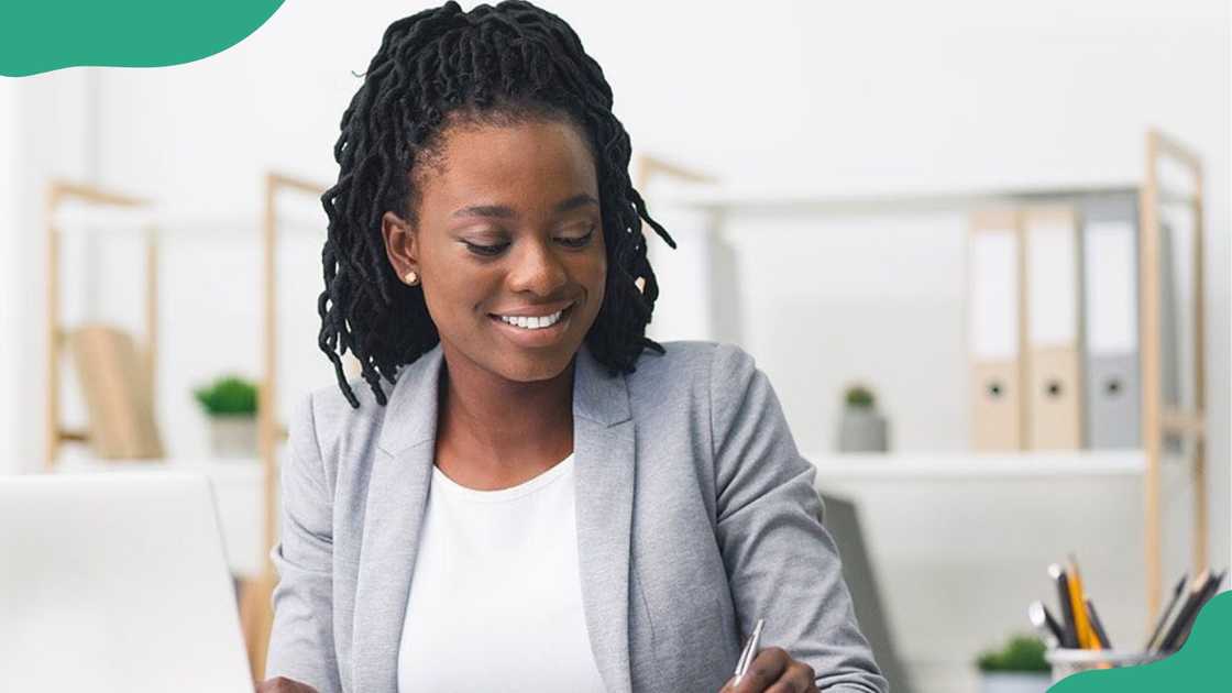 A young woman in office.