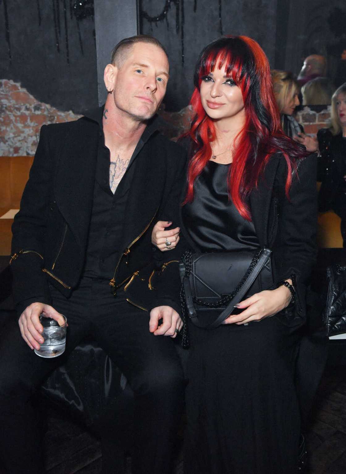 Alicia Dove and her husband attend Joshua Kane's The Shipwrecked Tailors' fashion show