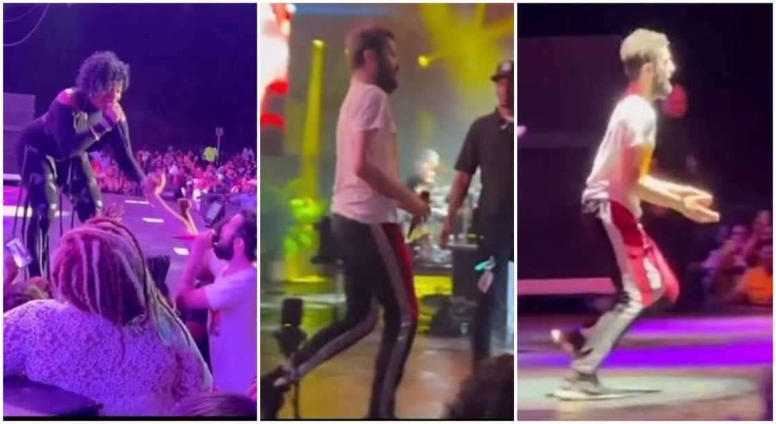 Fantasia dances with fan on stage during a concert. Fantasia dances with fan on stage during a concert.