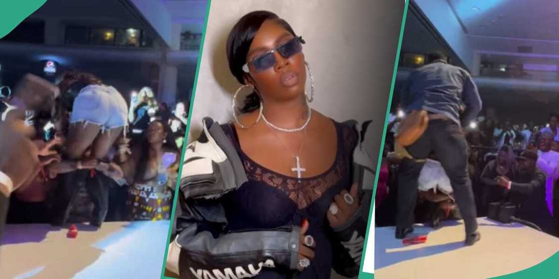 Tiwa Savage gets bundled to the ground by an overzealous fan. Tiwa Savage gets bundled to the ground by an overzealous fan.