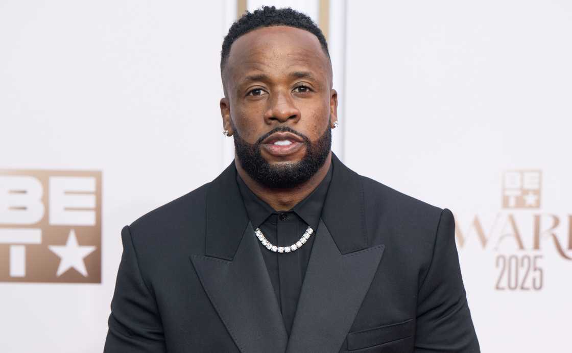 Yo Gotti poses on the red carpet of the 2025 BET Awards at Peacock Theatre
