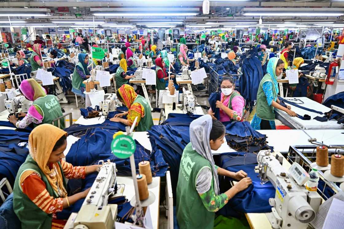 China, Vietnam and Bangladesh -- whose workers are seen here -- accounted for more than half of US apparel imports in the first five months of 2025 China, Vietnam and Bangladesh -- whose workers are seen here -- accounted for more than half of US apparel imports in the first five months of 2025
