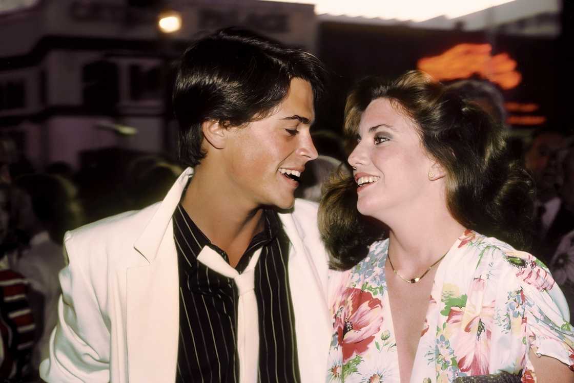 Rob Lowe and Melissa Gilbert look at each other during a screening