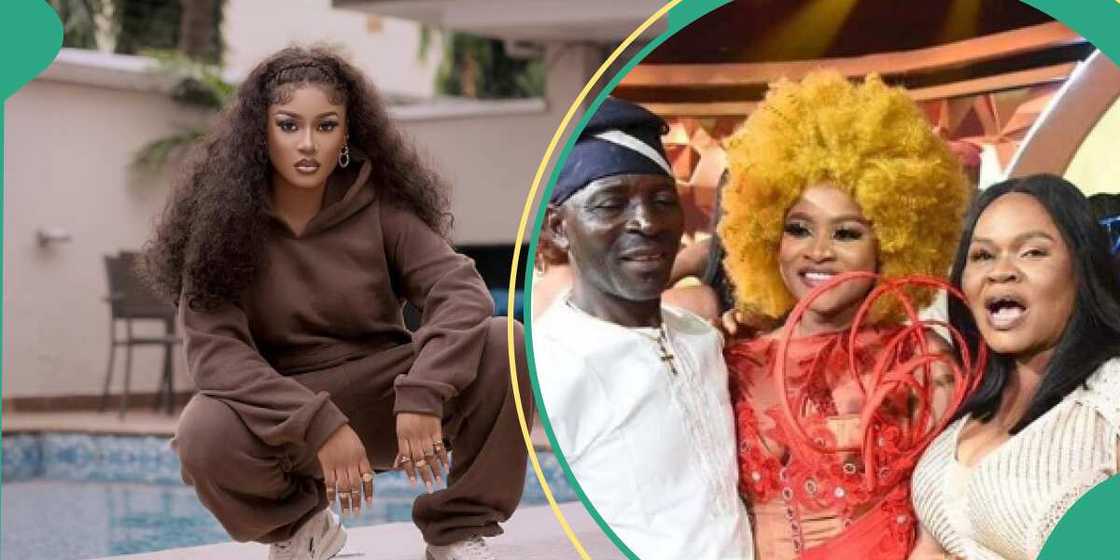 BBNaija's Phyna and family taking photos after winning the show. BBNaija's Phyna and family taking photos after winning the show.