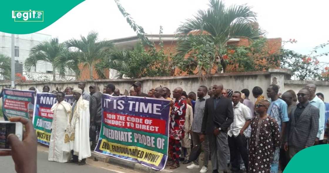 Protesters stormed Abuja, urging AGF and ICPC to probe NMDPRA boss over alleged $5m diversion. Protesters stormed Abuja, urging AGF and ICPC to probe NMDPRA boss over alleged $5m diversion.