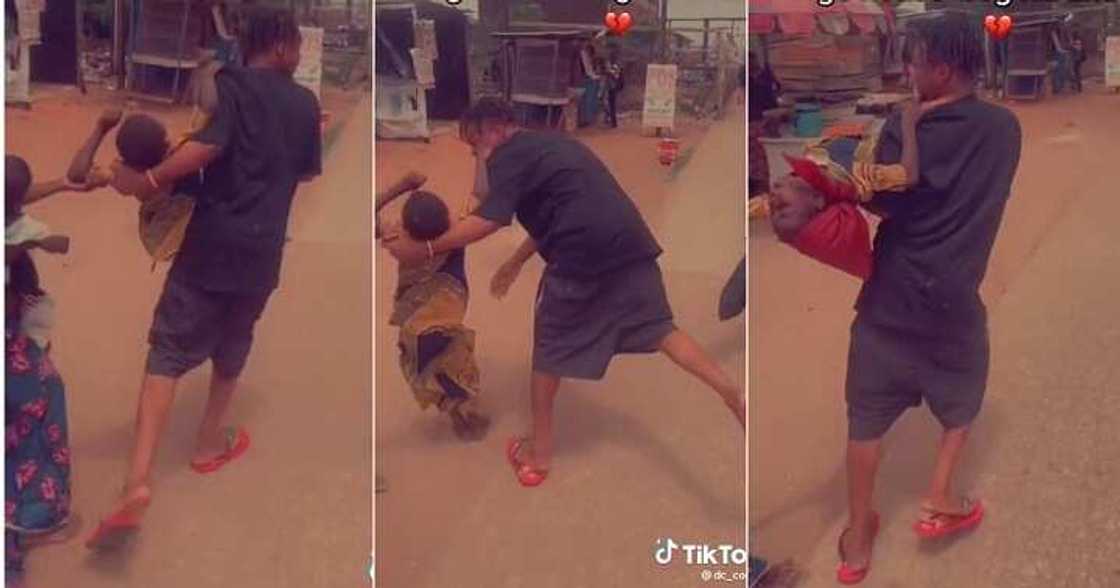 Man lifts child beggar Man lifts child beggar