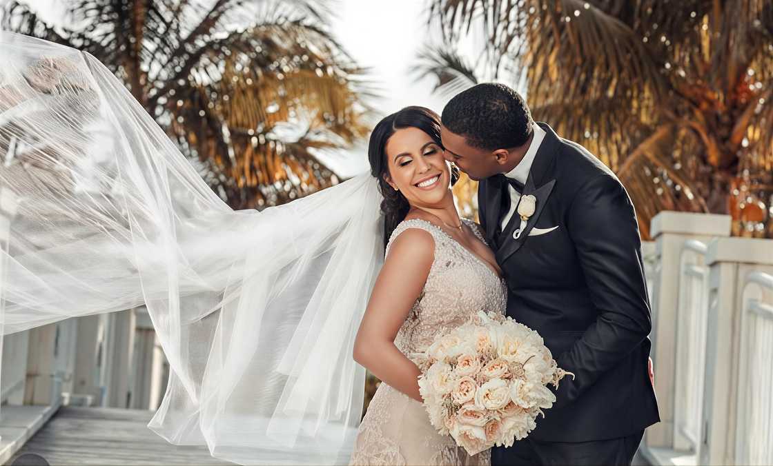 Radina Aneva and her husband Jeffery Jordan pose at their wedding