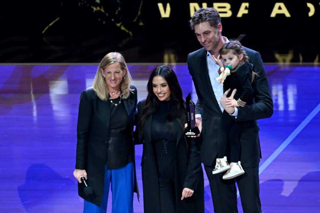 Cathy Engelbert and Vanessa Bryant and Pau Gasol posing for a photo