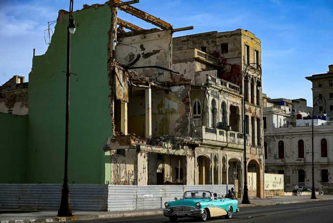 The makeshift addition of mezzanines, bathrooms and water tanks significantly add to the load these buildings were built to withstand