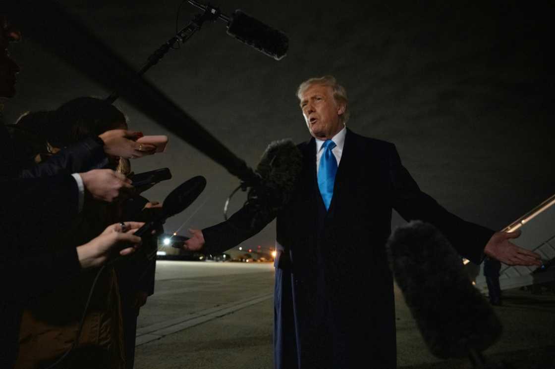 US President Donald Trump speaks to the press upon arrival at Joint Base Andrews in Maryland on February 2, 2025, as he returns to the White House from Florida.